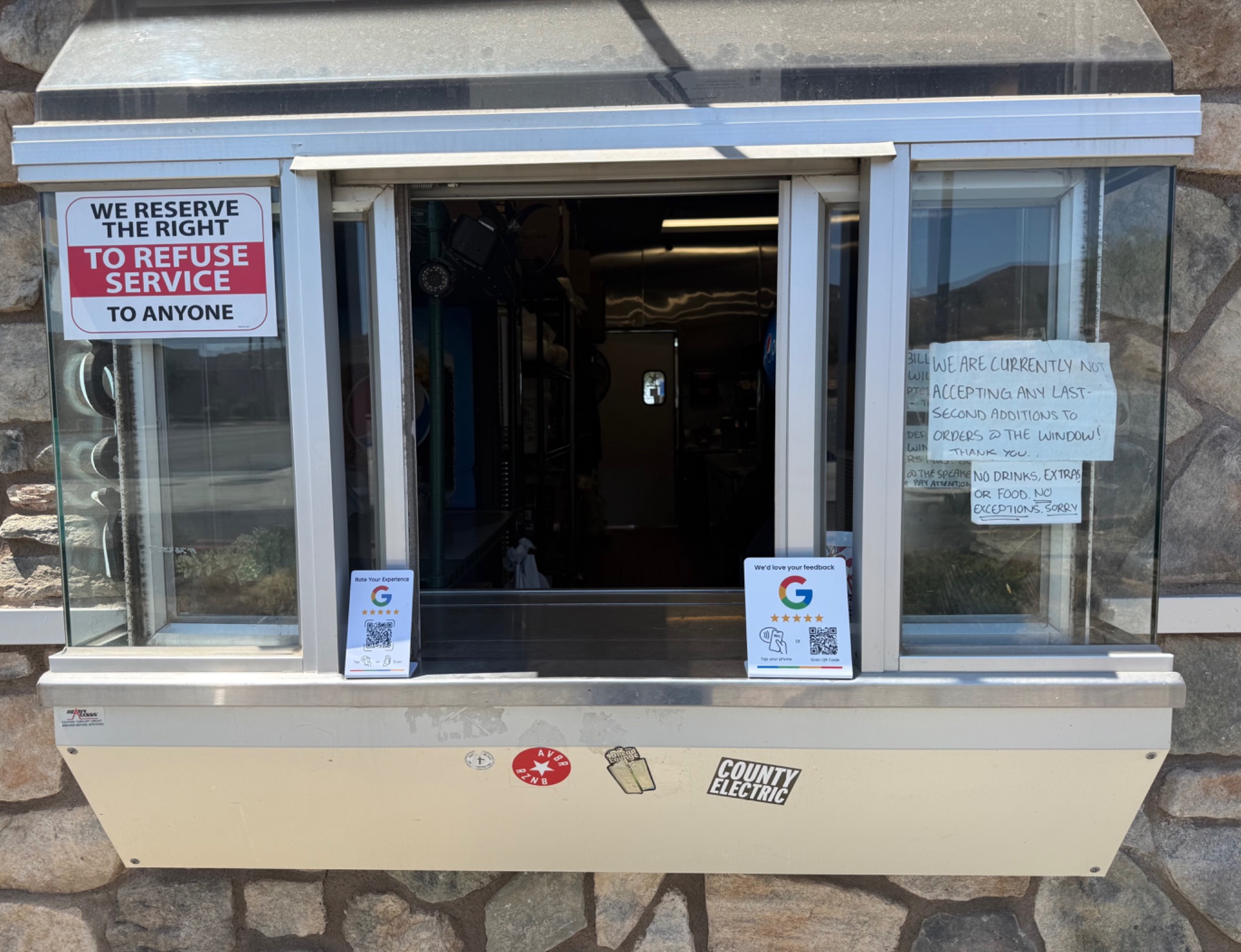 Review card displayed at a real business service window for size comparison